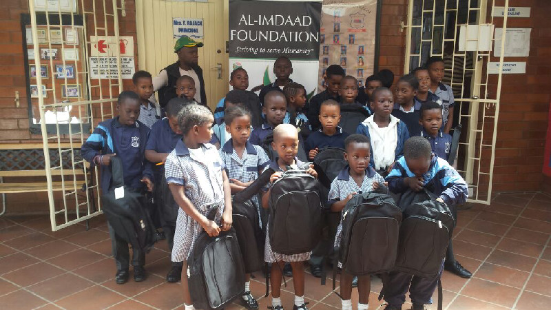 Many learners in South Africa who do not have bags still use plastic packets to carry their school books